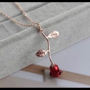 Rose gold rose pendant necklace